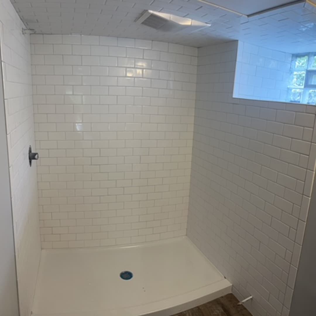 Newly constructed concrete driveway and retaining wall