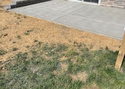 newly installed patio and wall installed by Angelo Mancuso LLC.