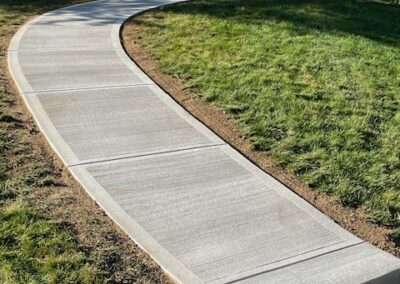 newly installed concrete walkway and stoop
